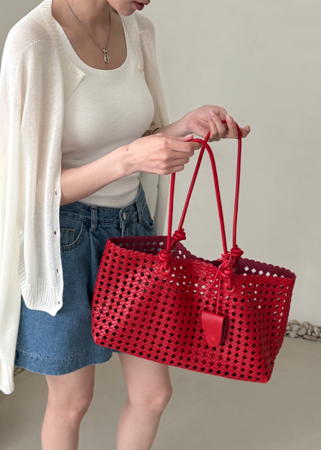 Eyelet shoulder bag