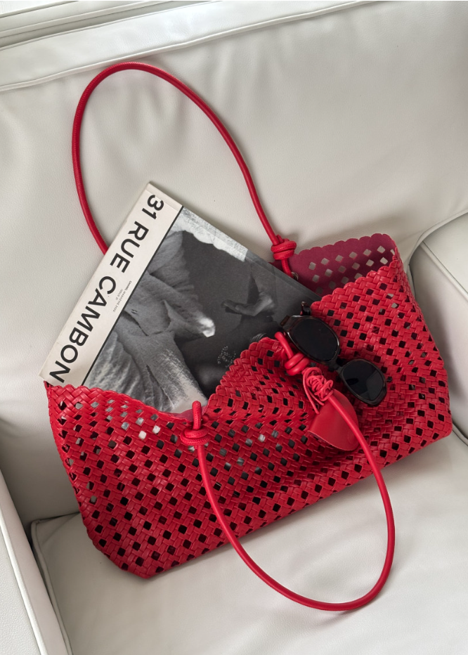 Eyelet shoulder bag
