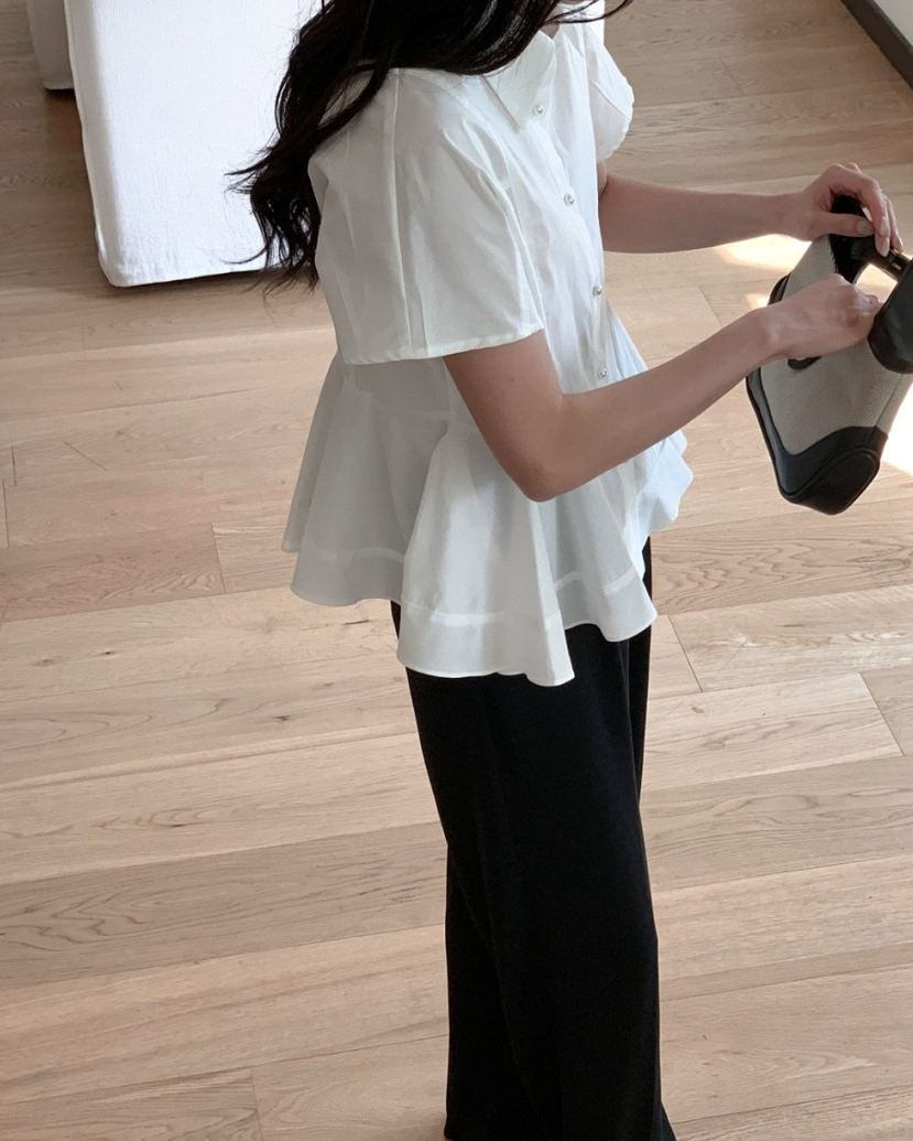 Pearl button peplum blouse