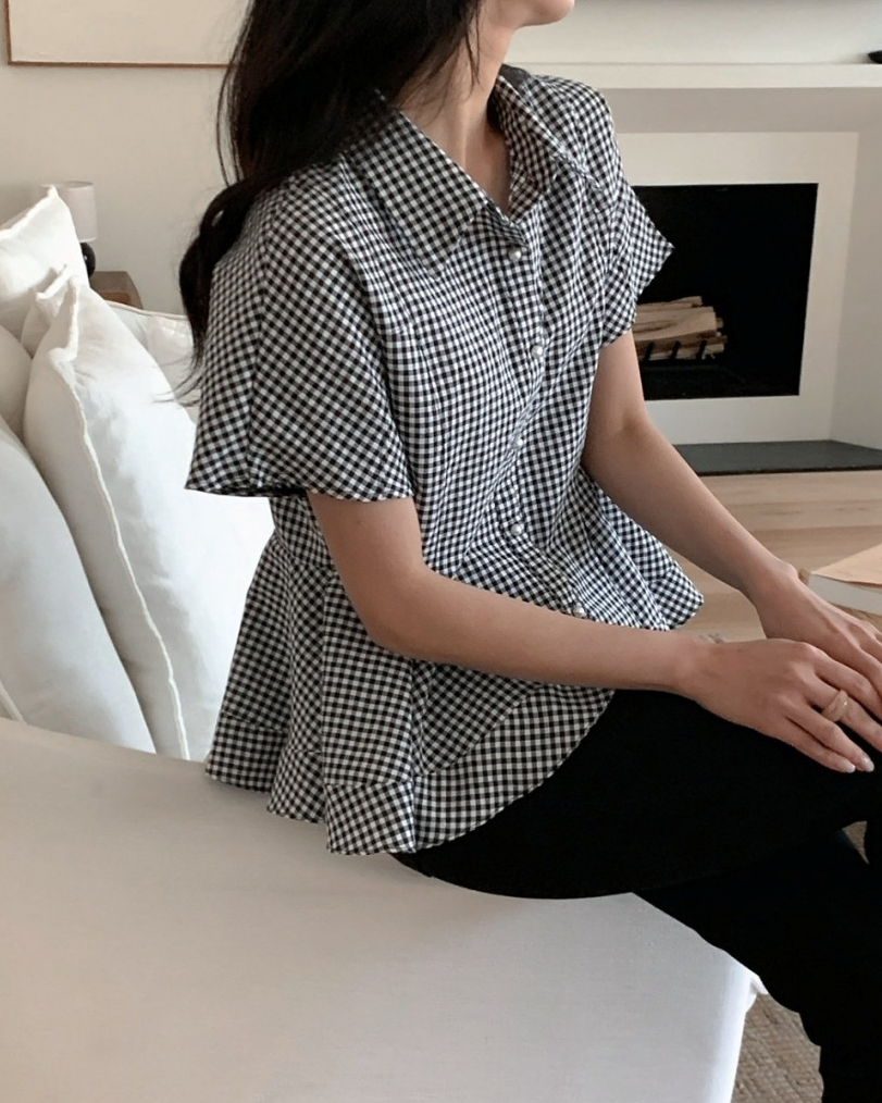 Pearl button peplum blouse