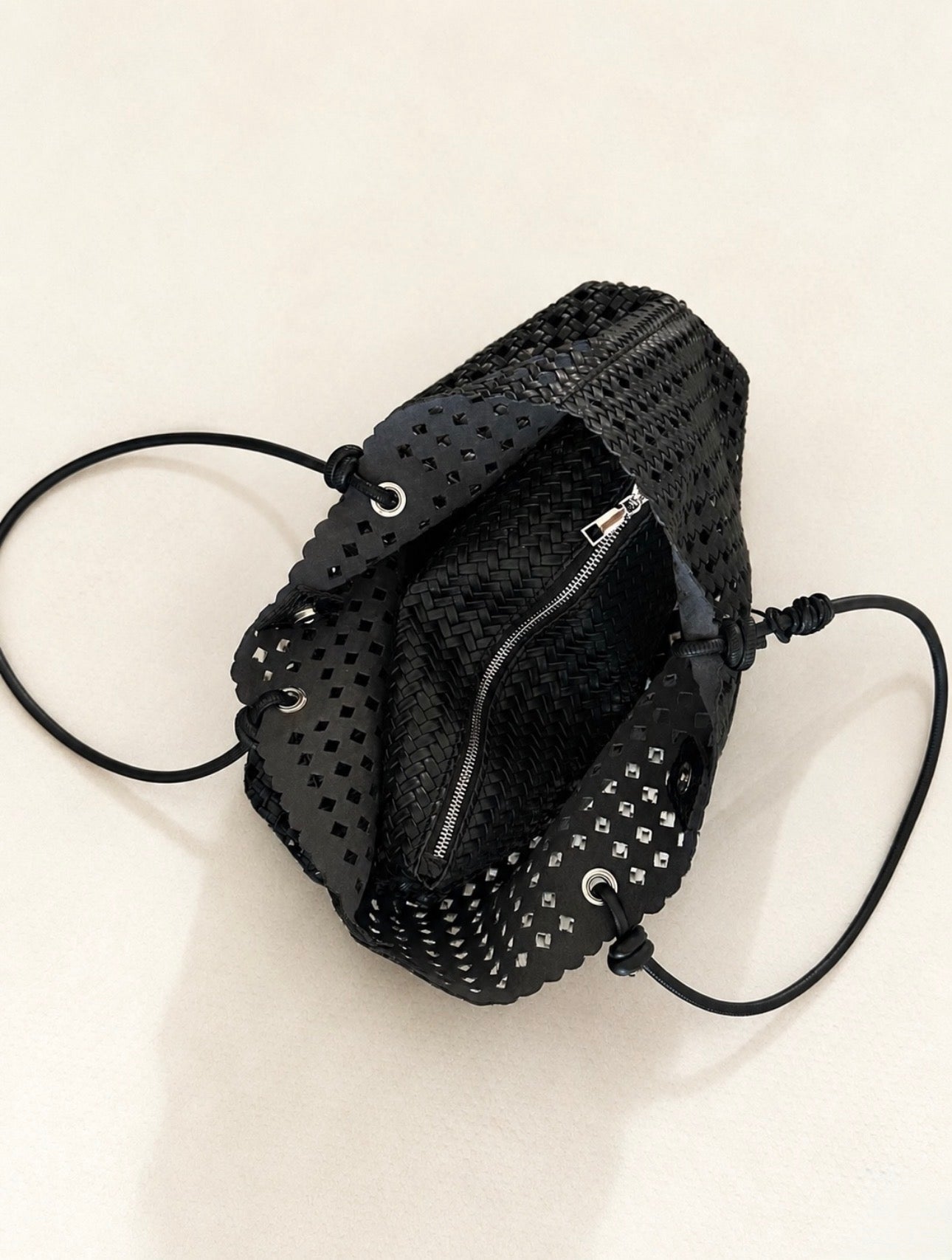 Eyelet shoulder bag