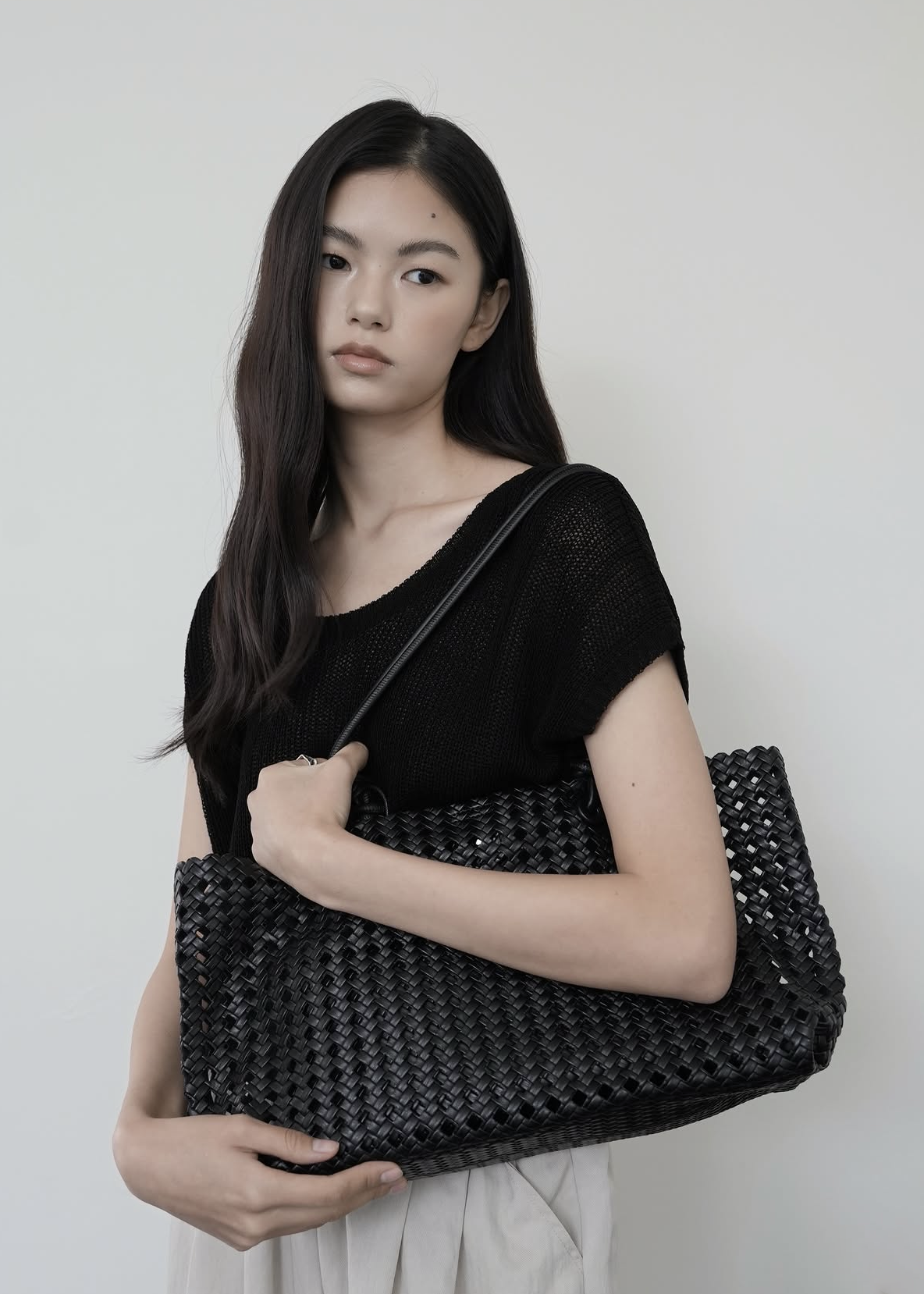 Eyelet shoulder bag